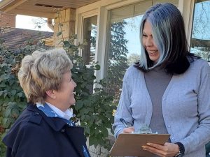 Cherryl Strathmann talking with a voter